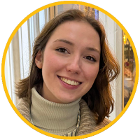 Smiling young woman in turtleneck, headshot photo inside yellow circular frame